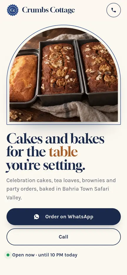 Crumbs Cottage website on a phone