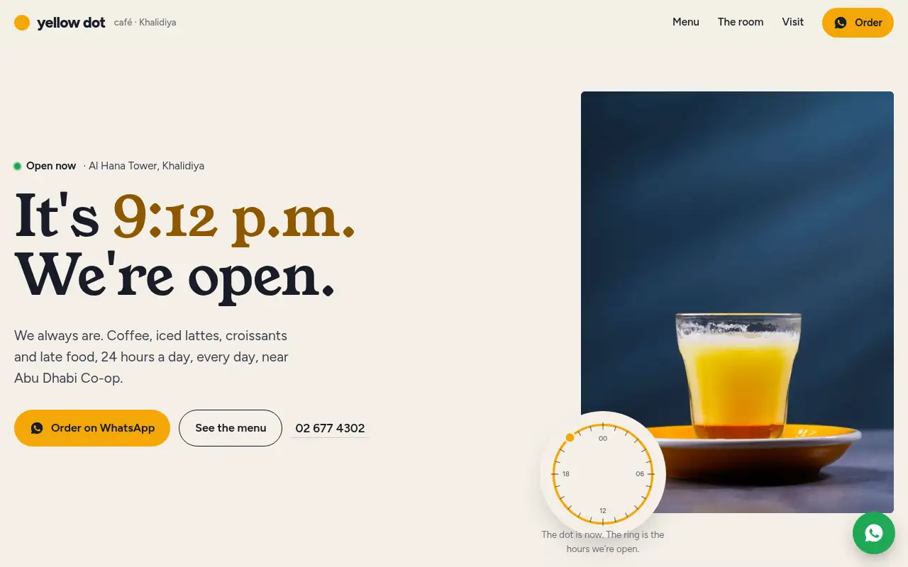 Yellow Dot Cafe website on a laptop